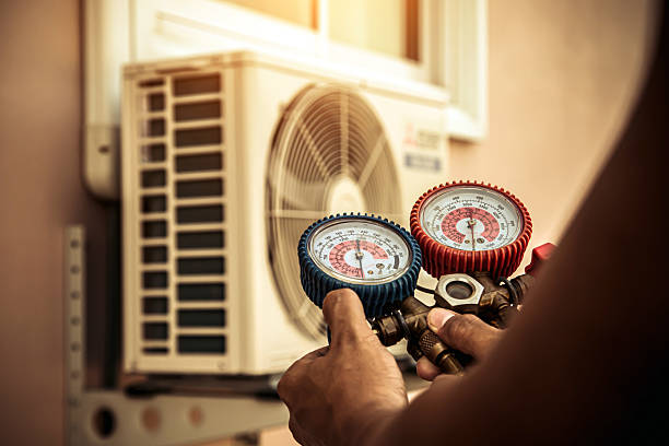 Professional Hvac technician working in Belle Mina, AL